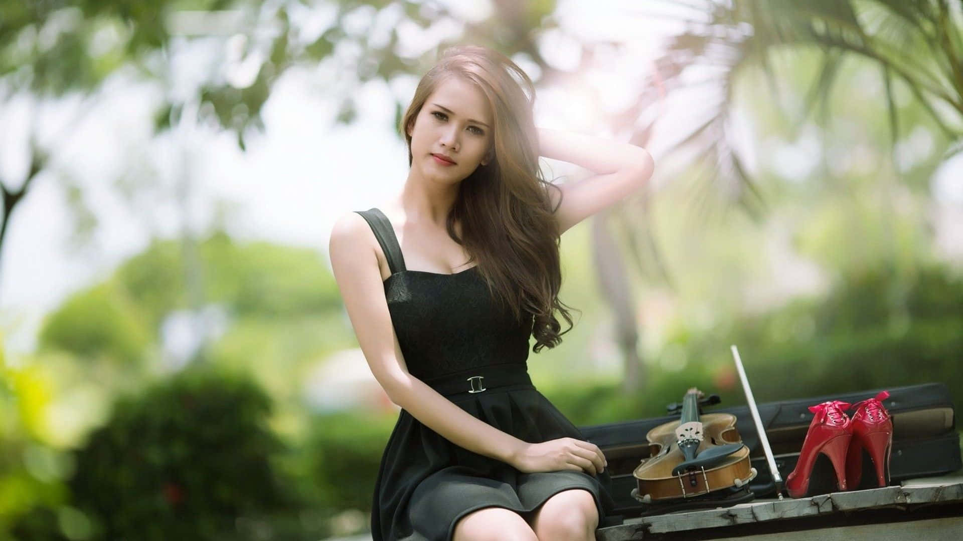 A Beautiful Young Woman With A Subtle Smile Background