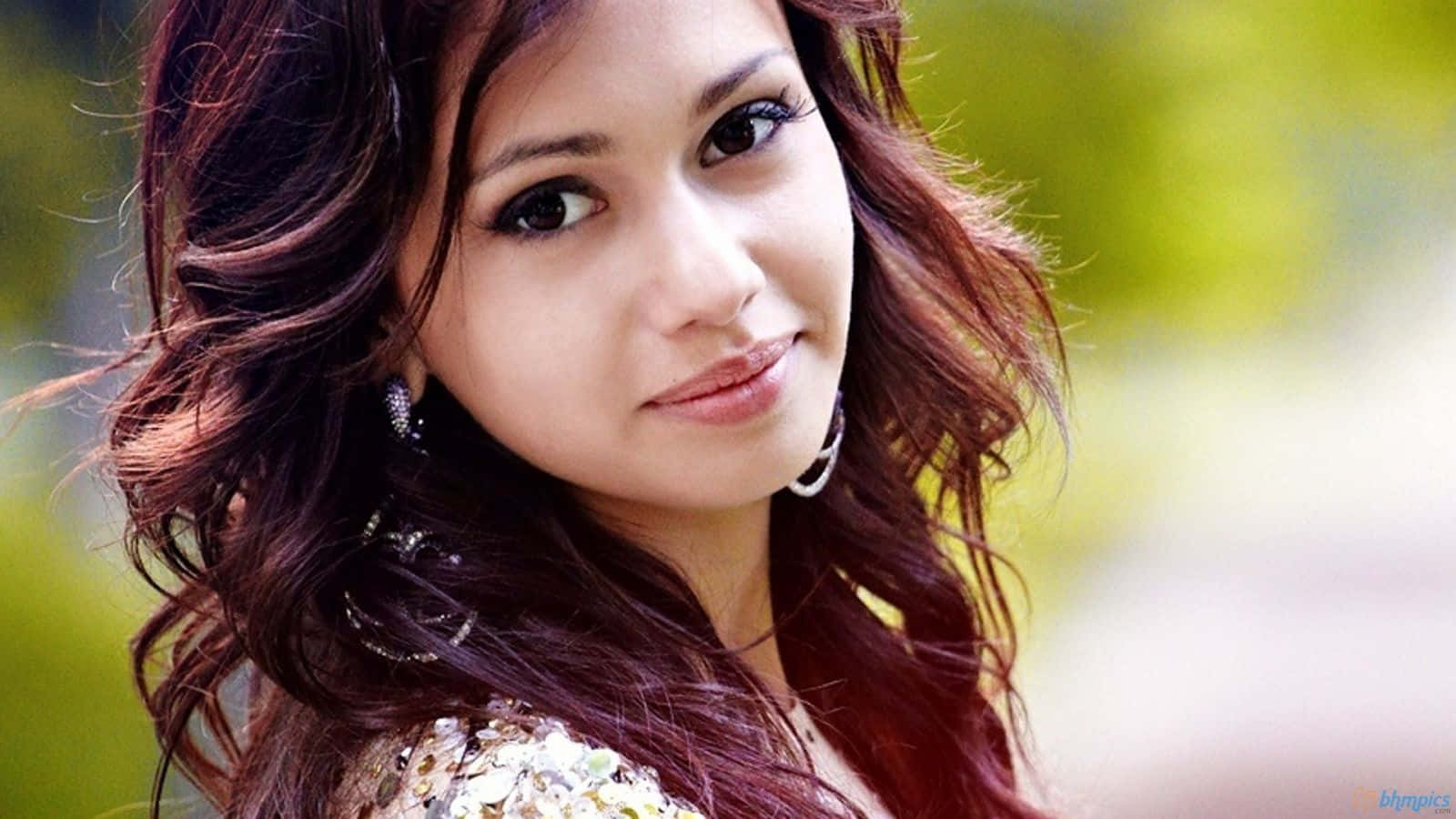 A Beautiful Young Woman With Long Hair Background