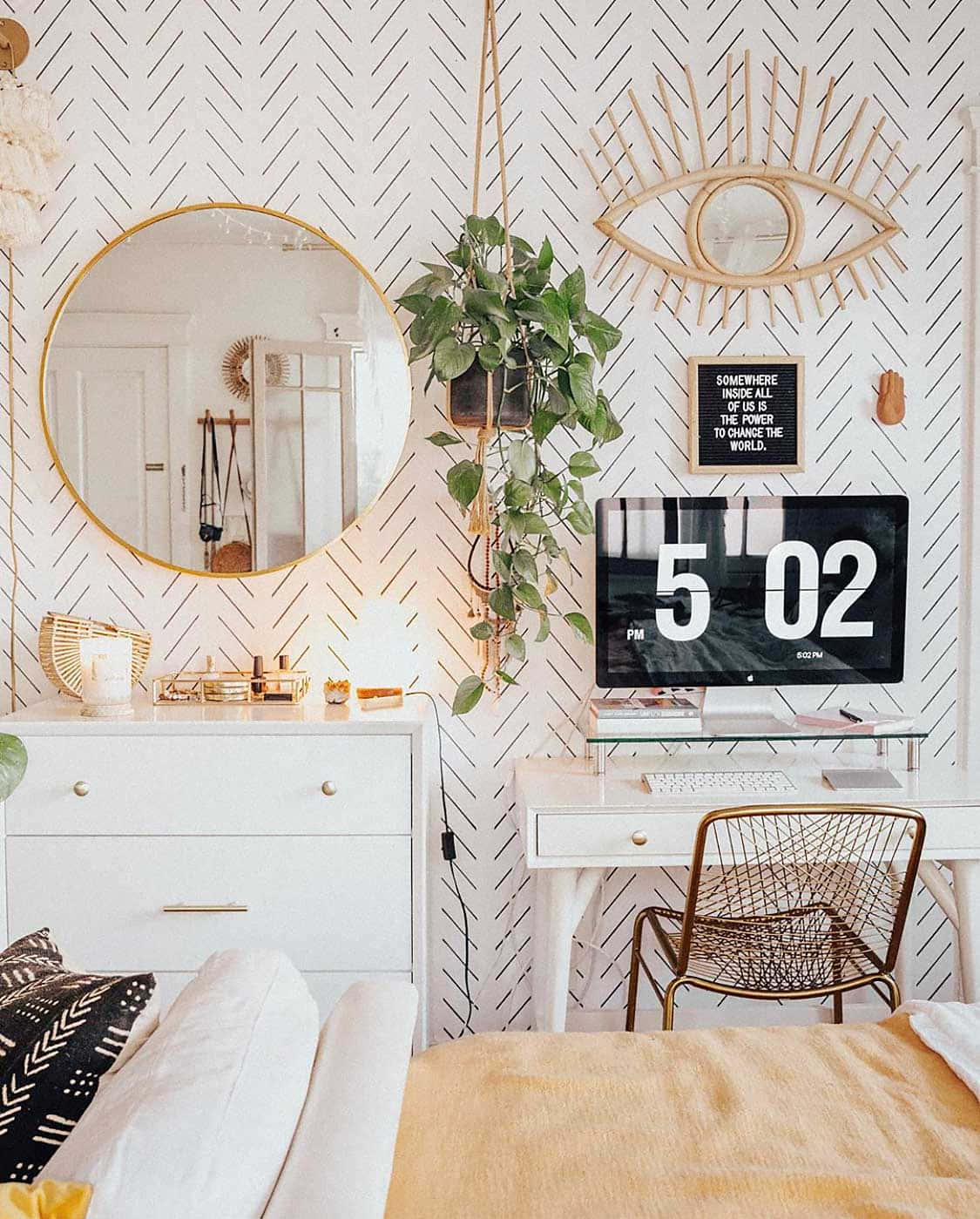 A Bedroom With A White Bed And A Yellow Wall Background