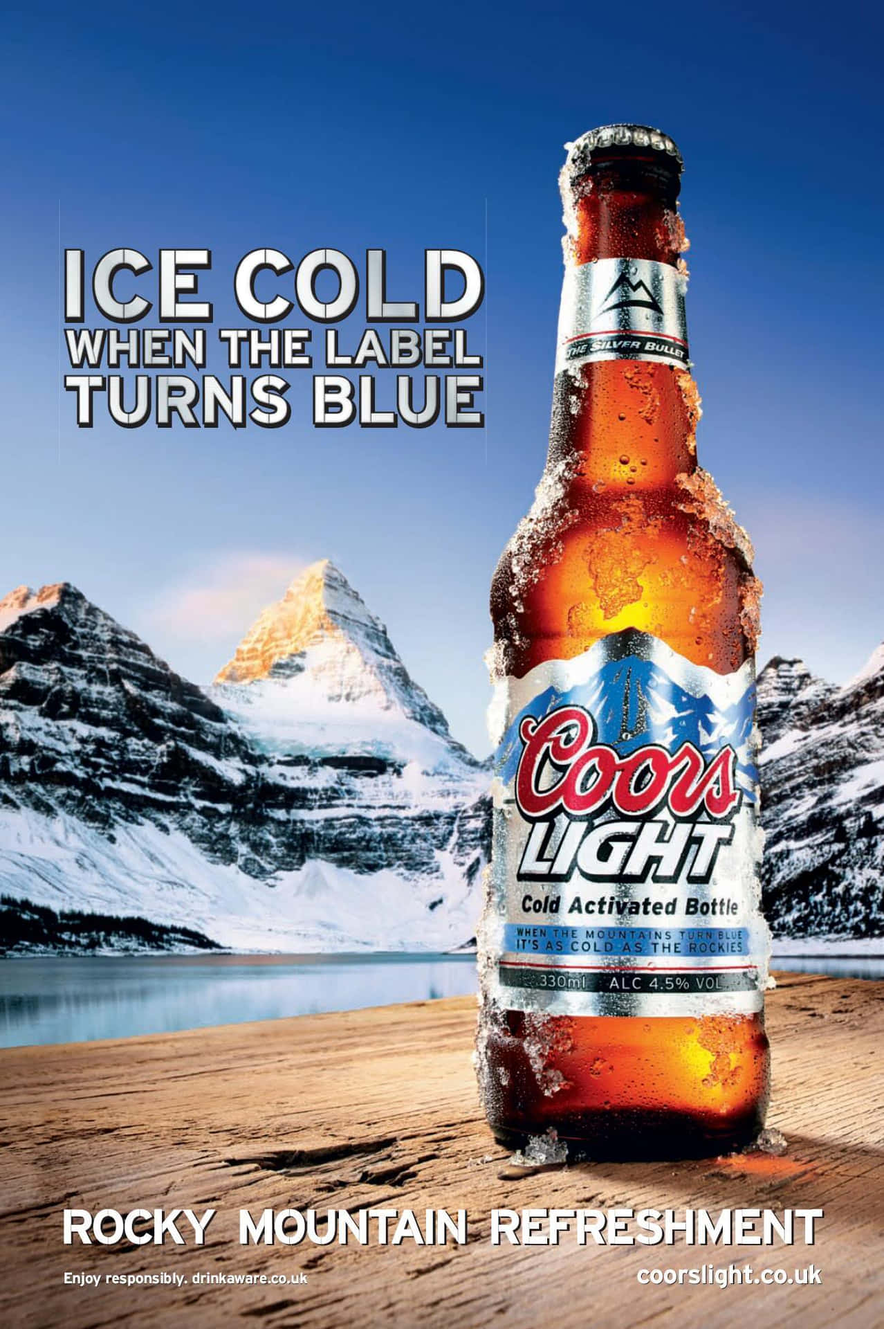 A Beer Advertisement With The Words Ice Cold When It Turns Blue Background