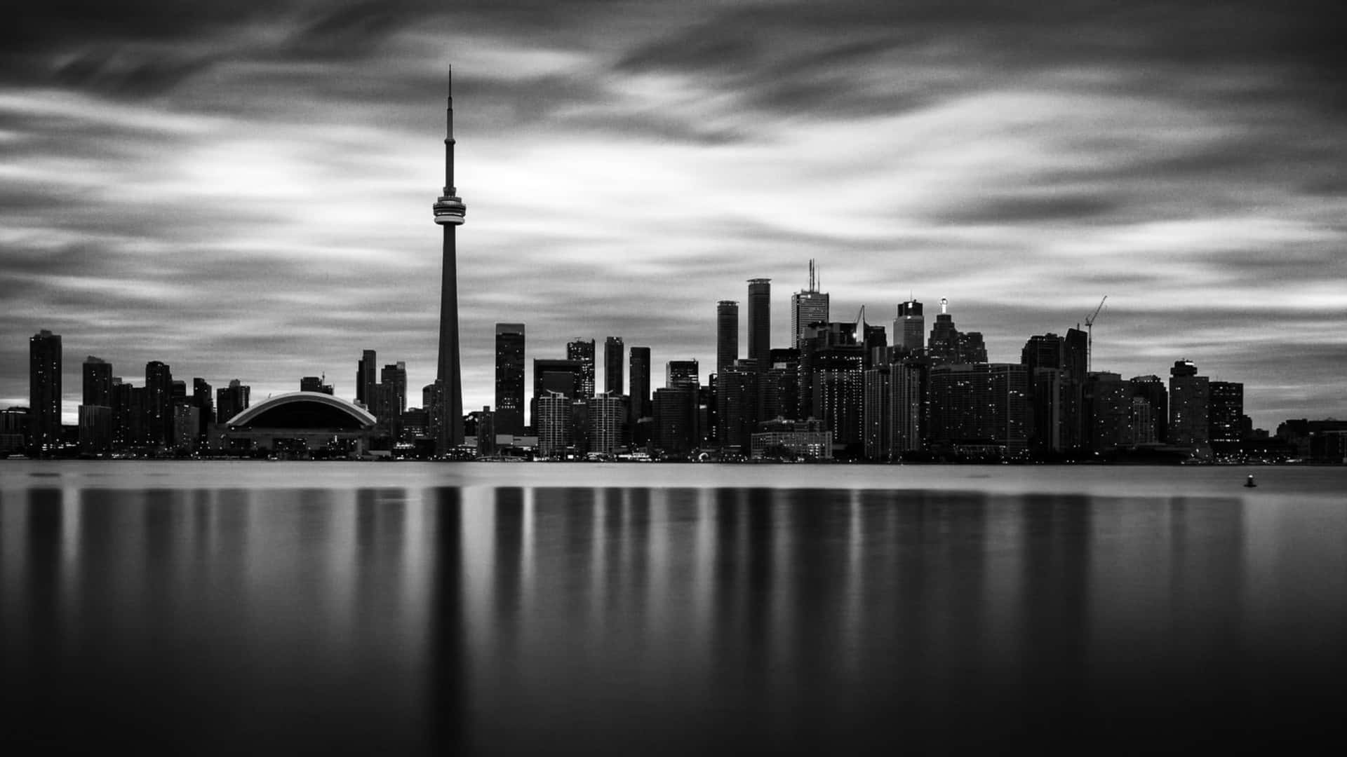 A Bird's Eye View Of A Vibrant Black And White City Background