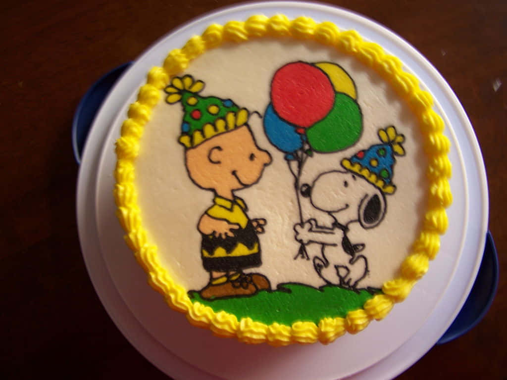 A Birthday Cake With Charlie Brown And Snoopy Background