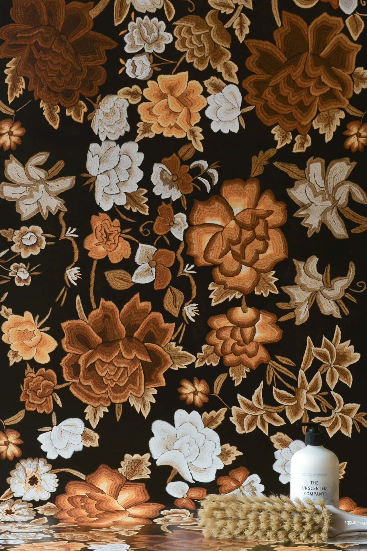 A Black And Brown Floral Wallpaper With A Brush Background
