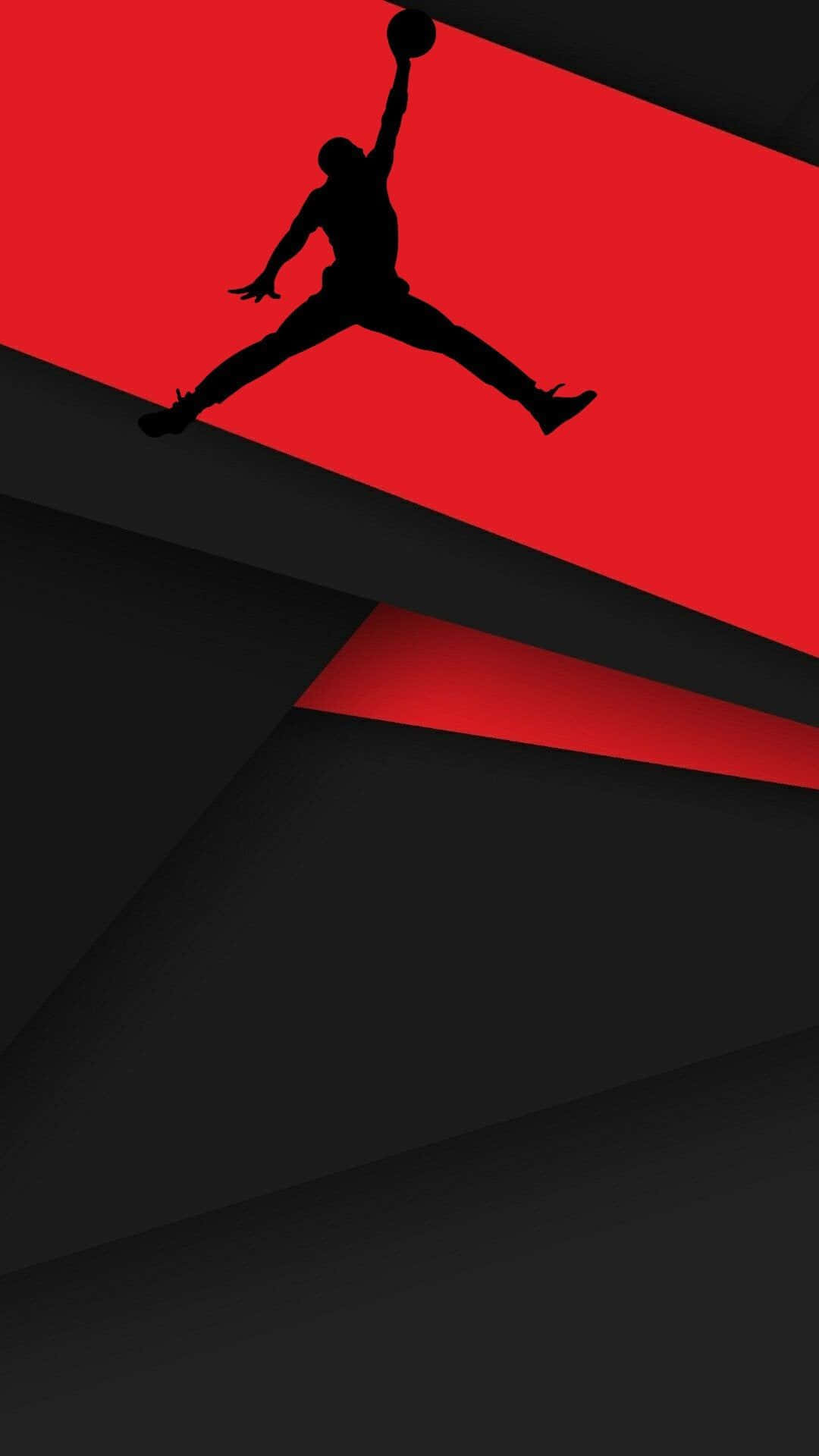 A Black And Red Jordan Logo With A Silhouette Background