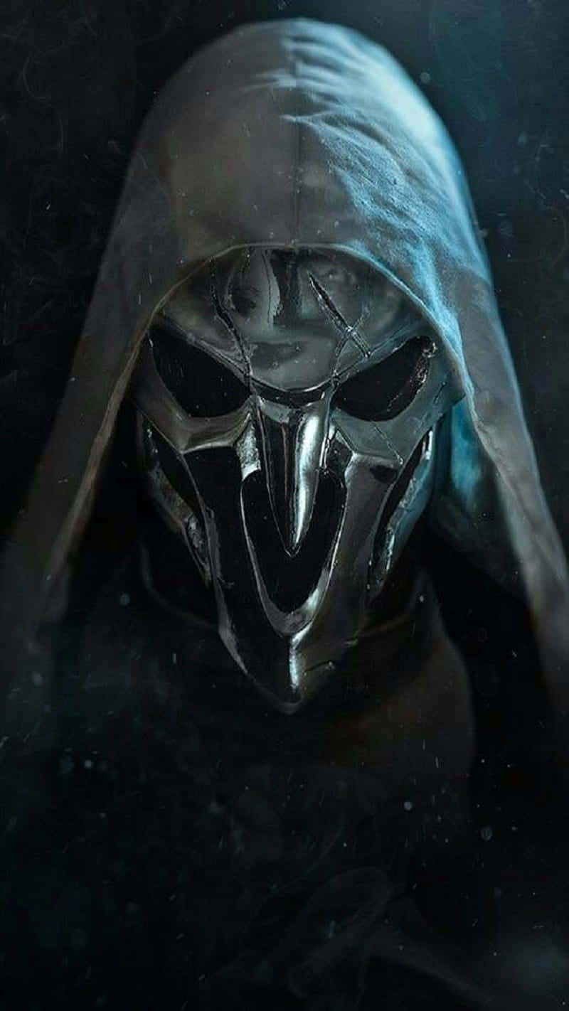 A Black And Silver Hooded Figure With A Hood Background