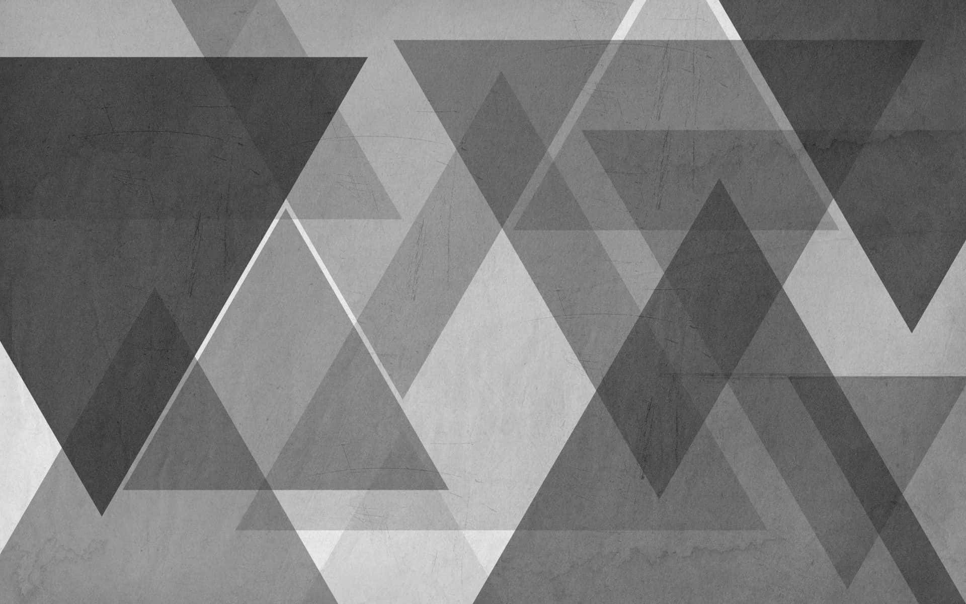 A Black And White Abstract Pattern With Triangles