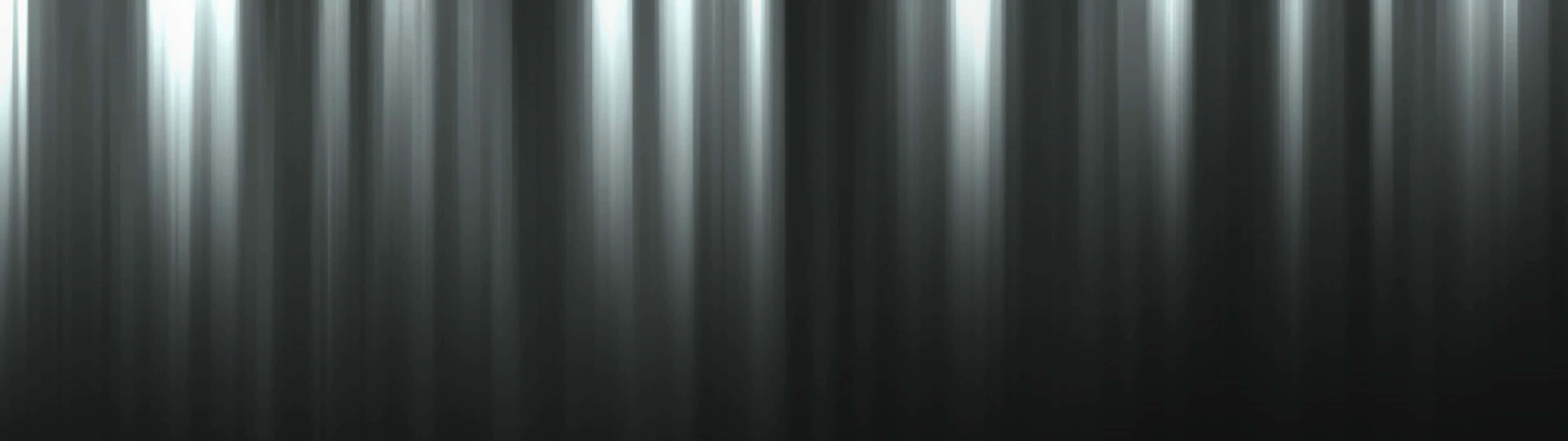 A Black And White Background With Light Streaks Background