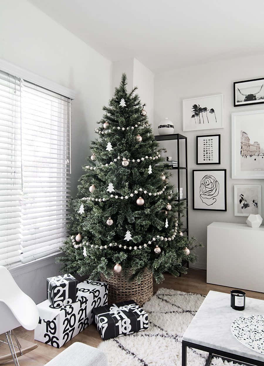 A Black And White Christmas Tree In A Living Room Background