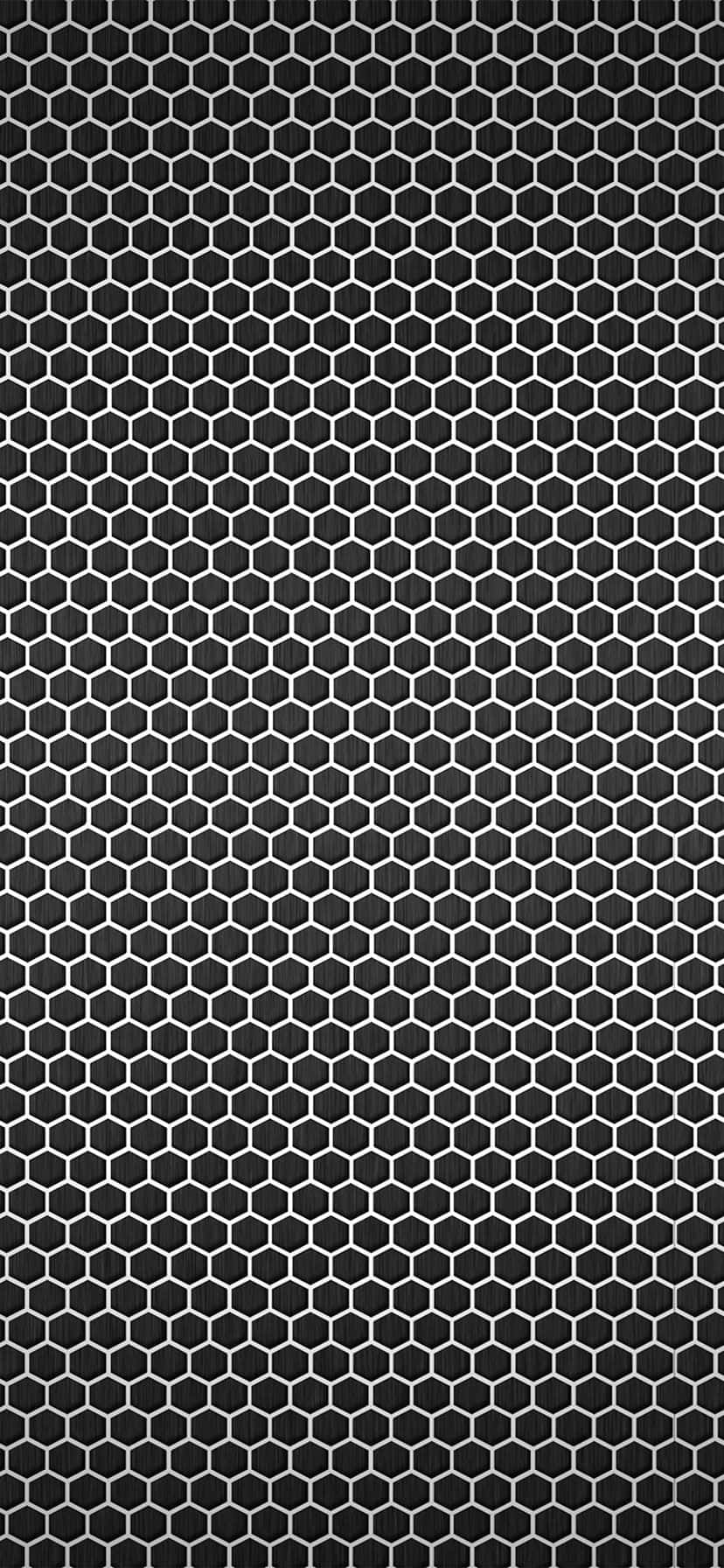 A Black And White Hexagonal Pattern On A Black Background Background