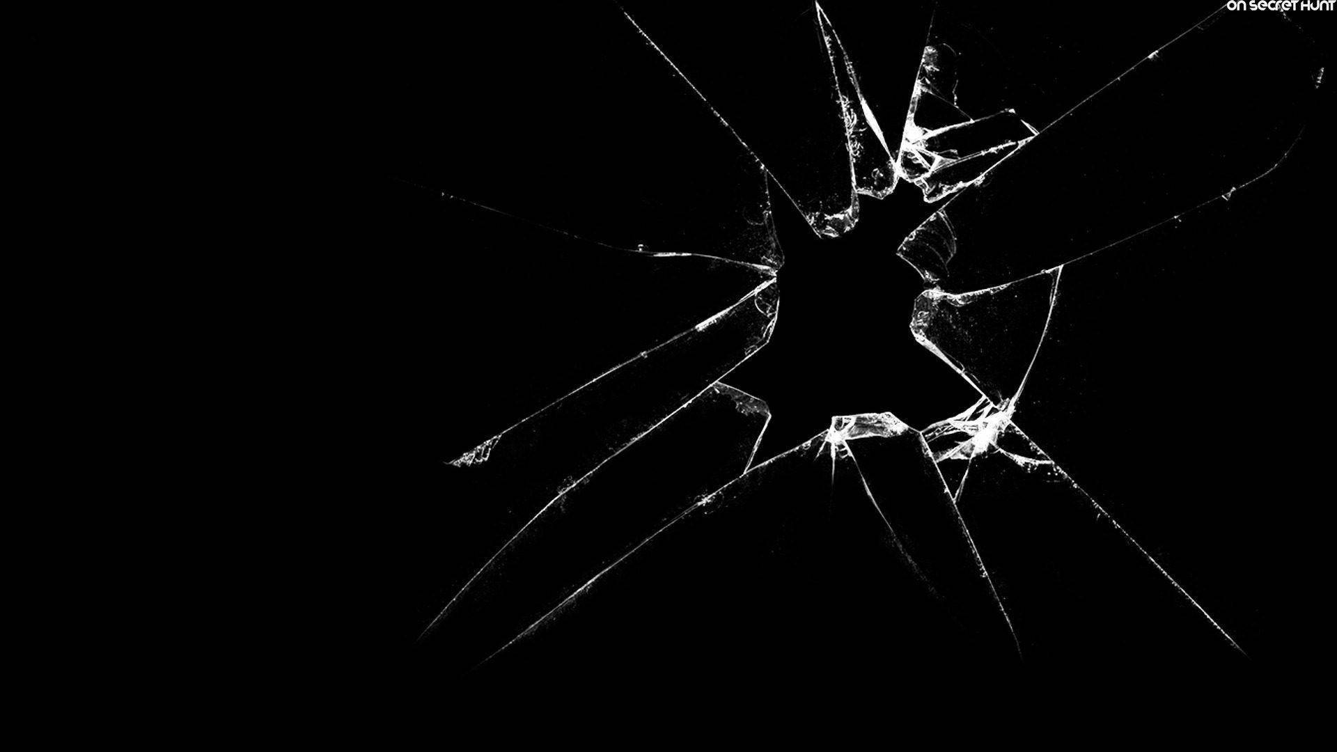 A Black And White Image Of A Broken Glass Background