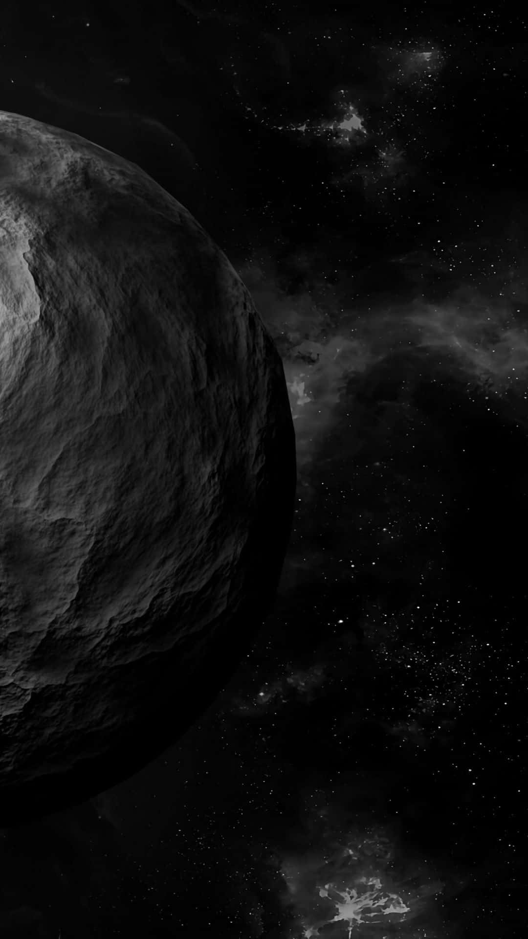 A Black And White Image Of A Large Planet Background
