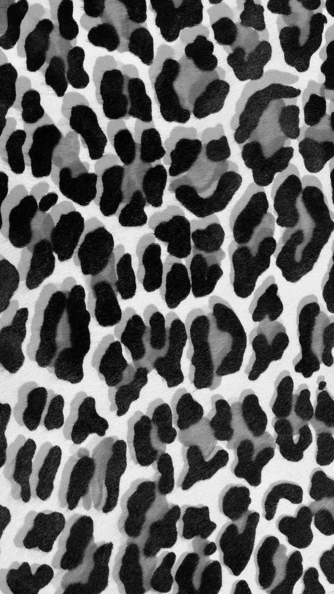 A Black And White Image Of A Leopard Print Background