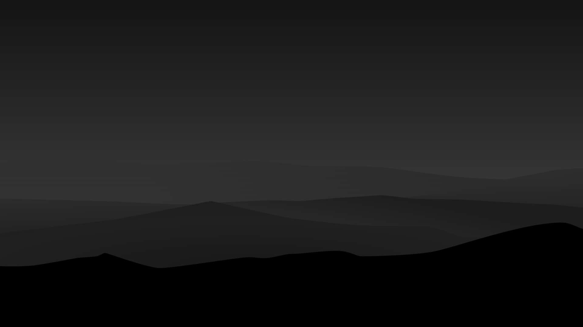 A Black And White Image Of A Mountain Range Background