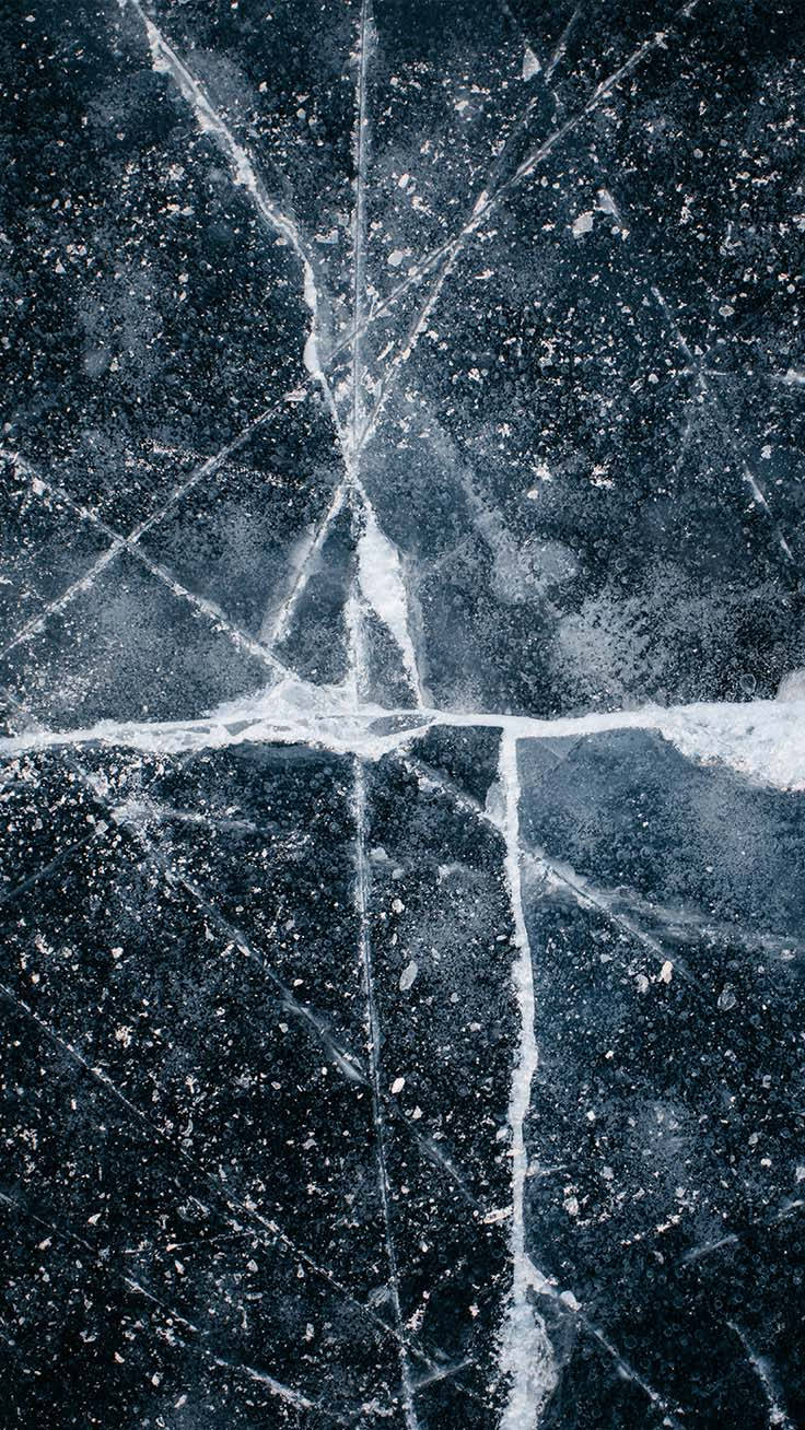 A Black And White Image Of Ice