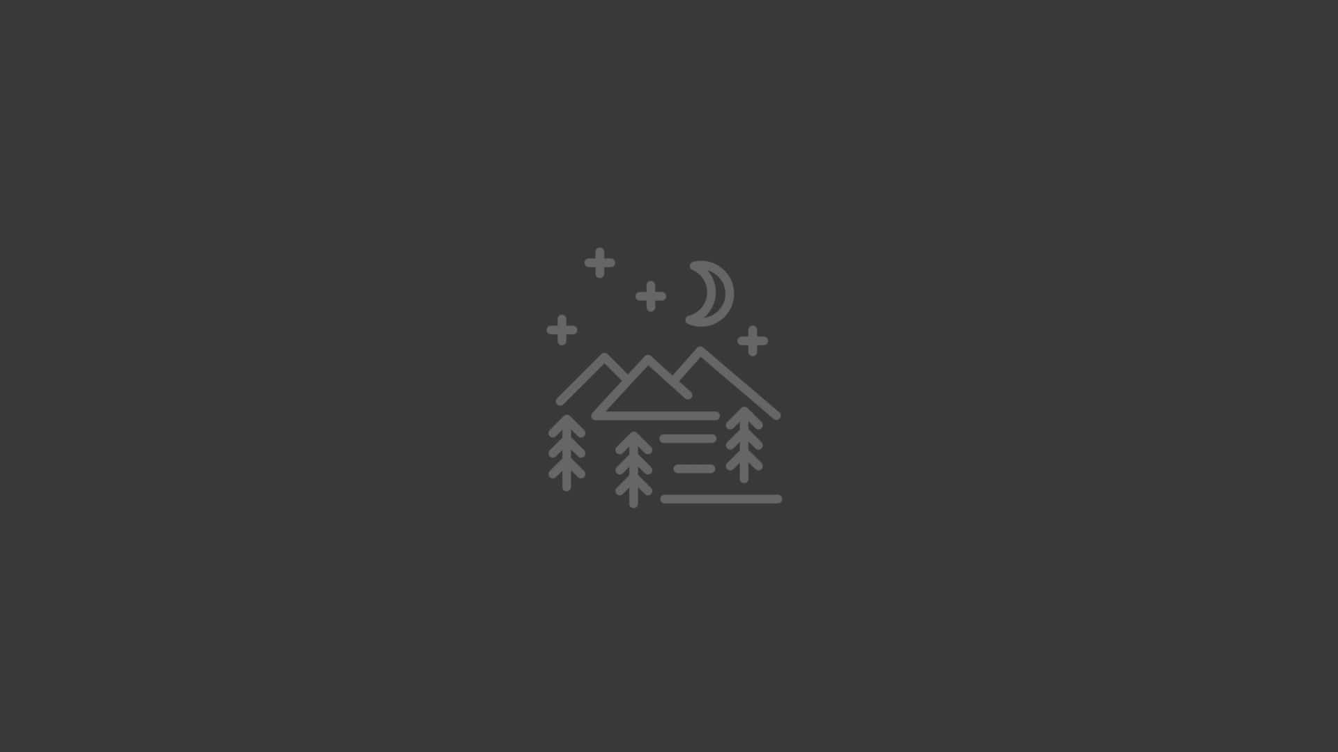 A Black And White Logo With A Mountain And A Tree Background
