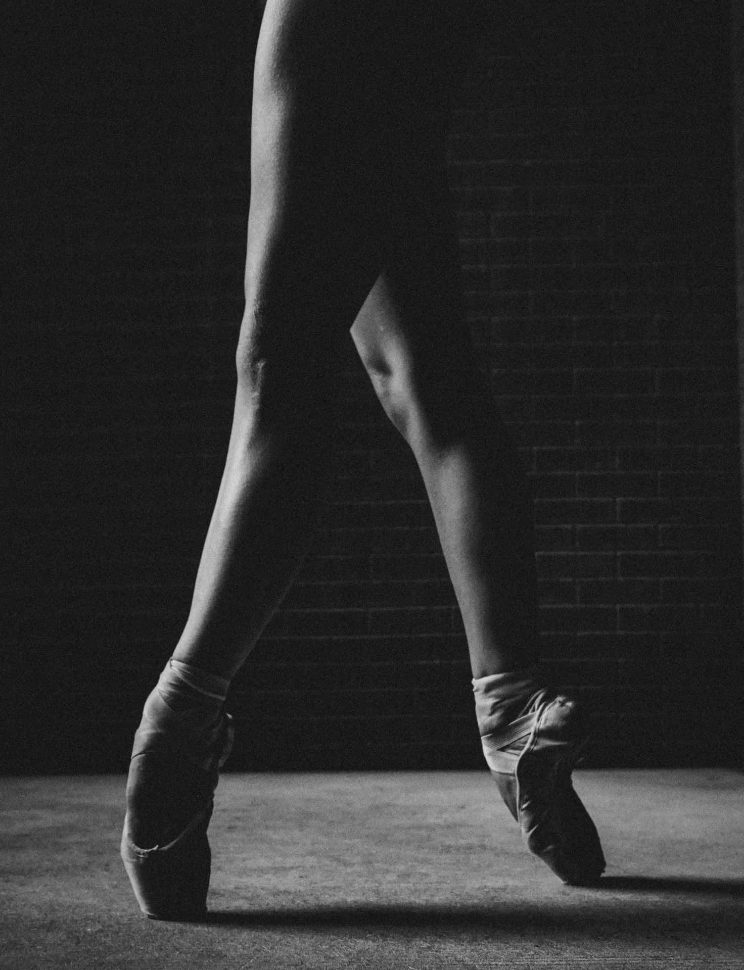 A Black And White Photo Of A Ballet Dancer Background