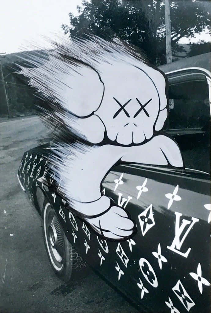 A Black And White Photo Of A Car With A Graffiti On It Background