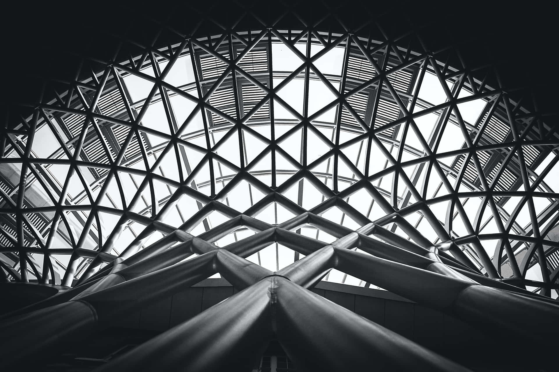 A Black And White Photo Of A Circular Structure