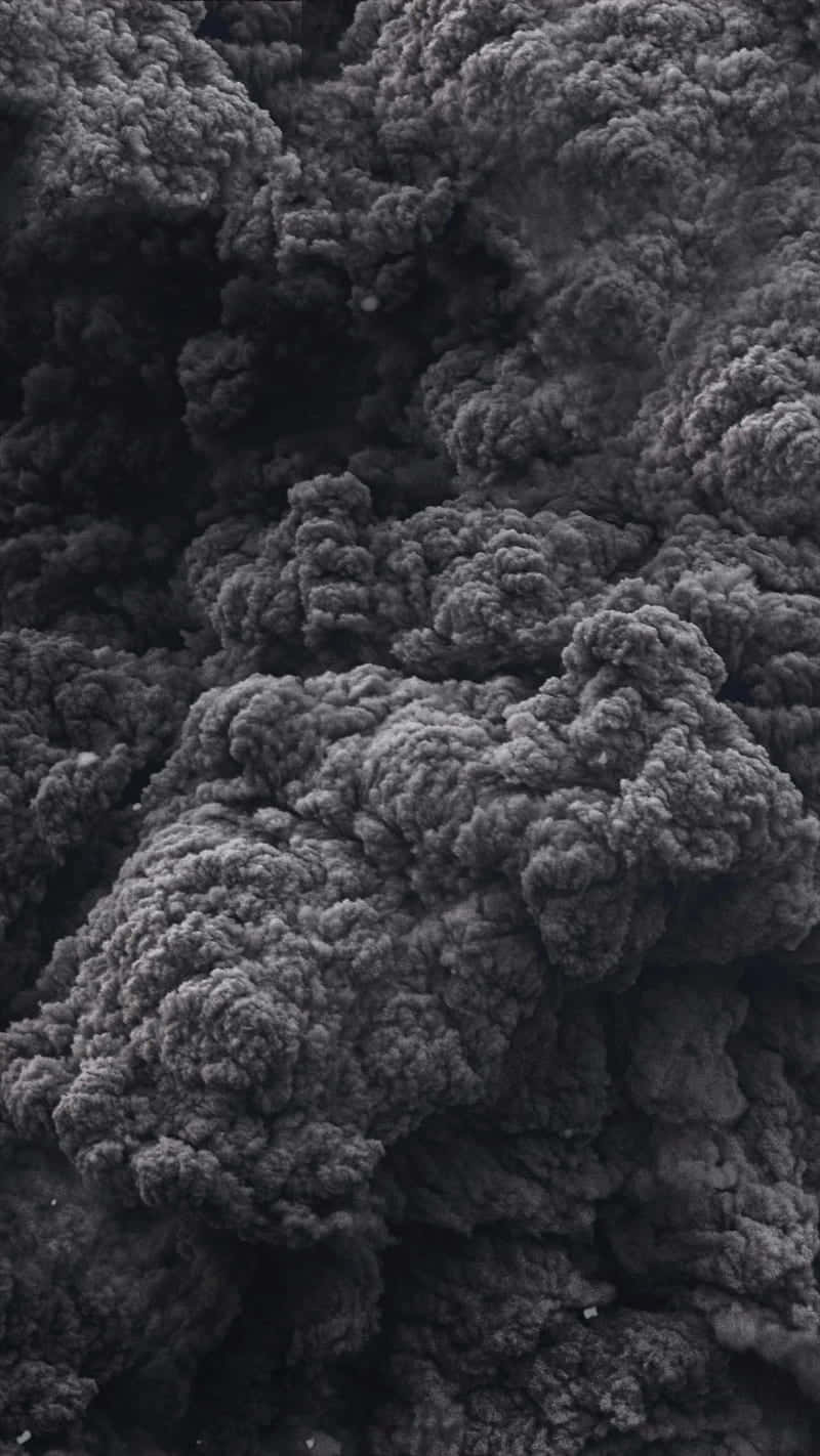 A Black And White Photo Of A Mountain