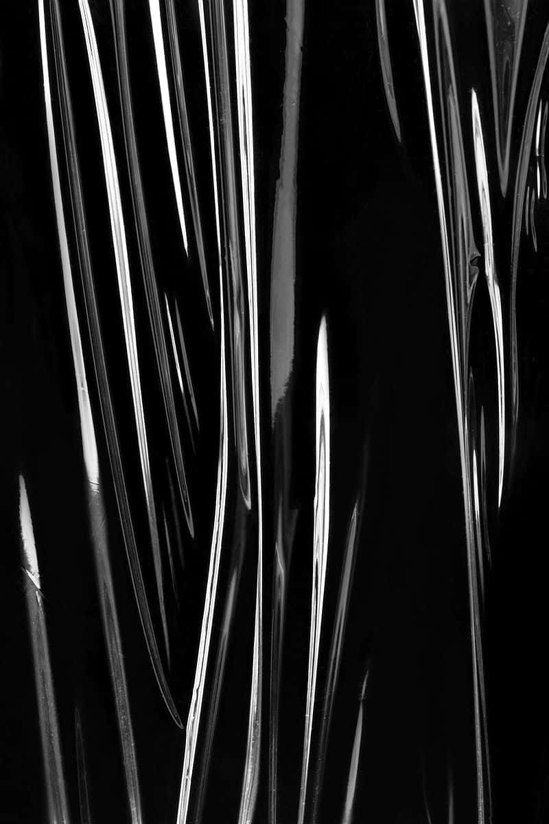 A Black And White Photo Of A Plastic Bag Background