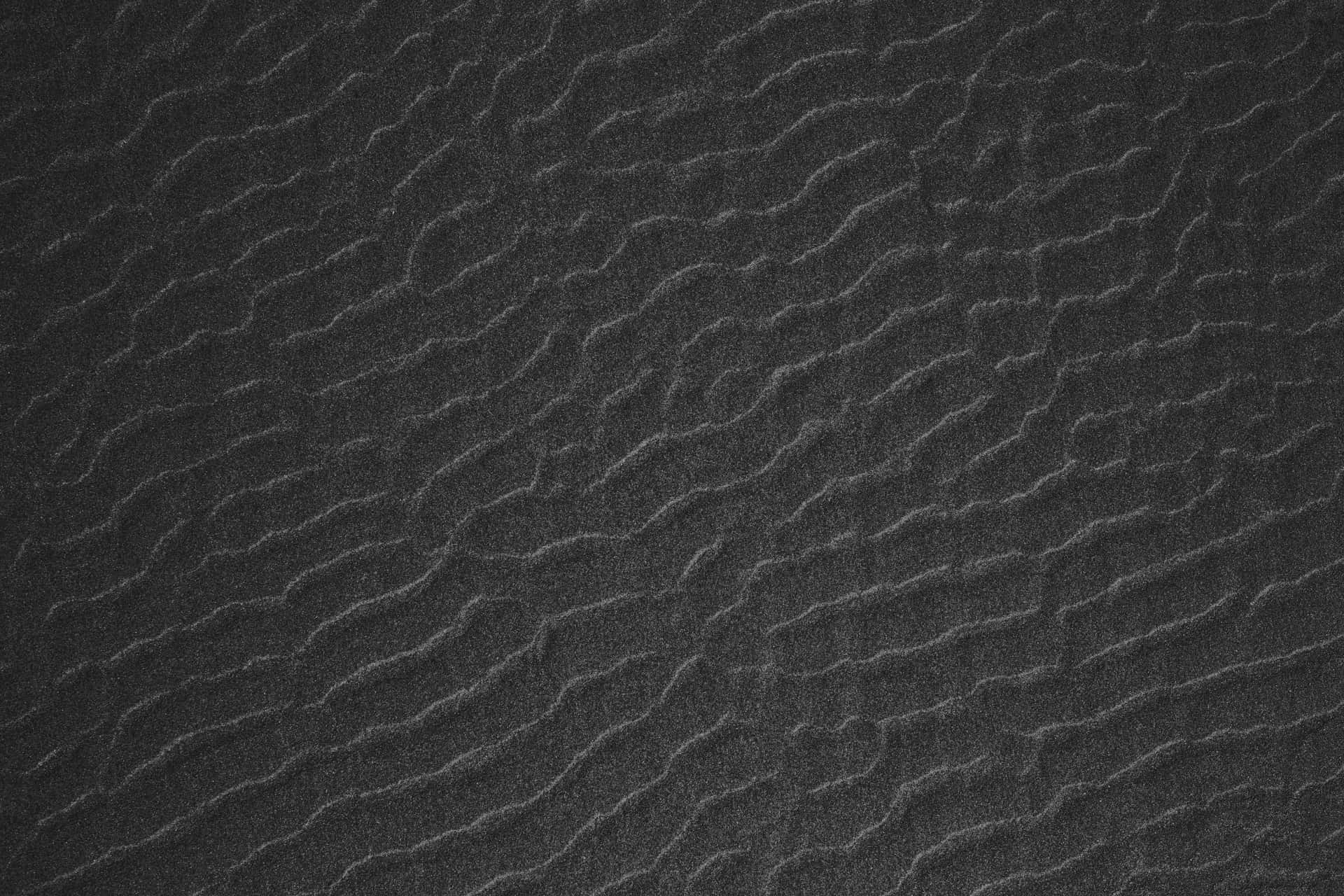 A Black And White Photo Of A Sand Texture Background