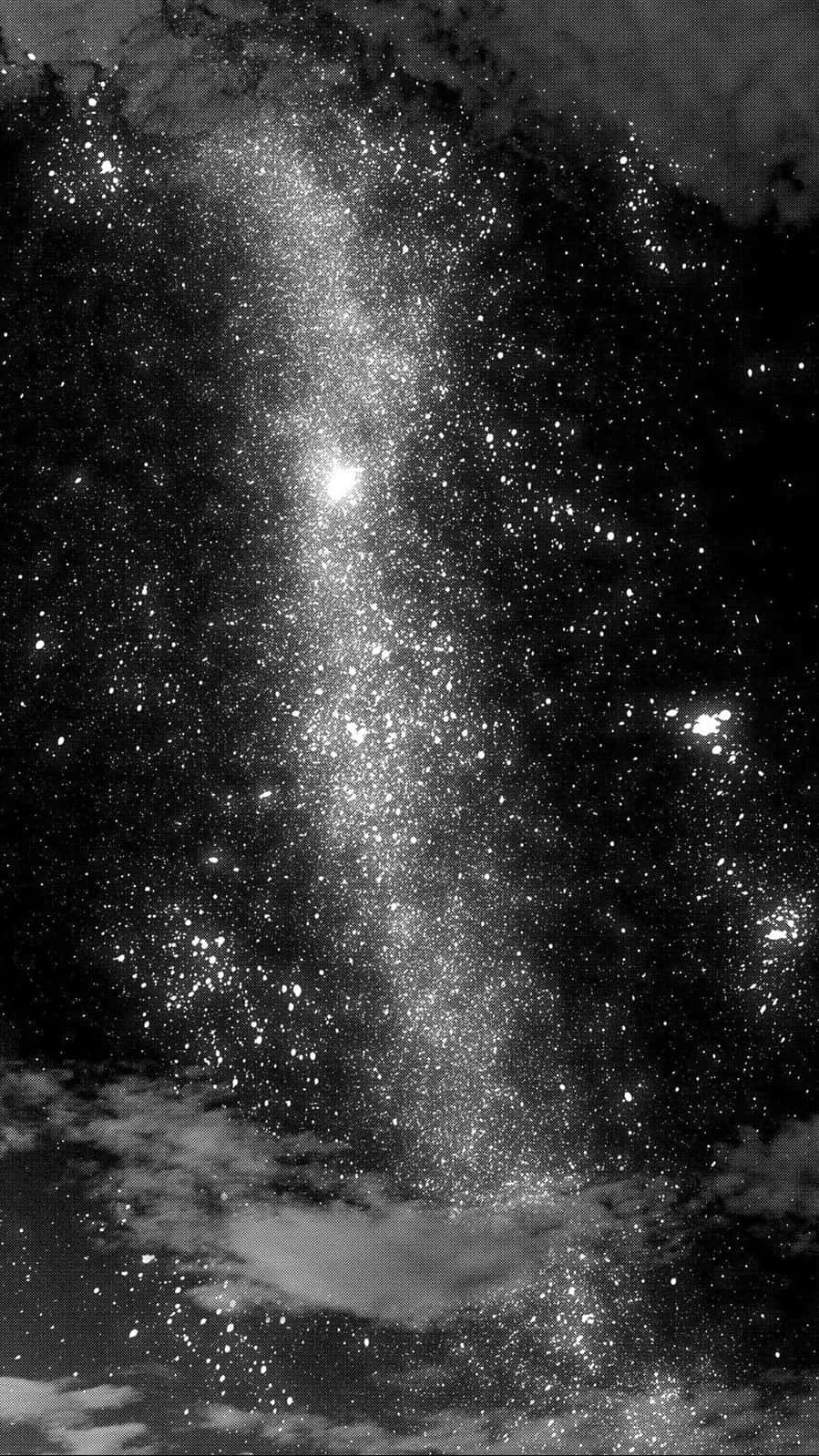 A Black And White Photo Of The Milky Background