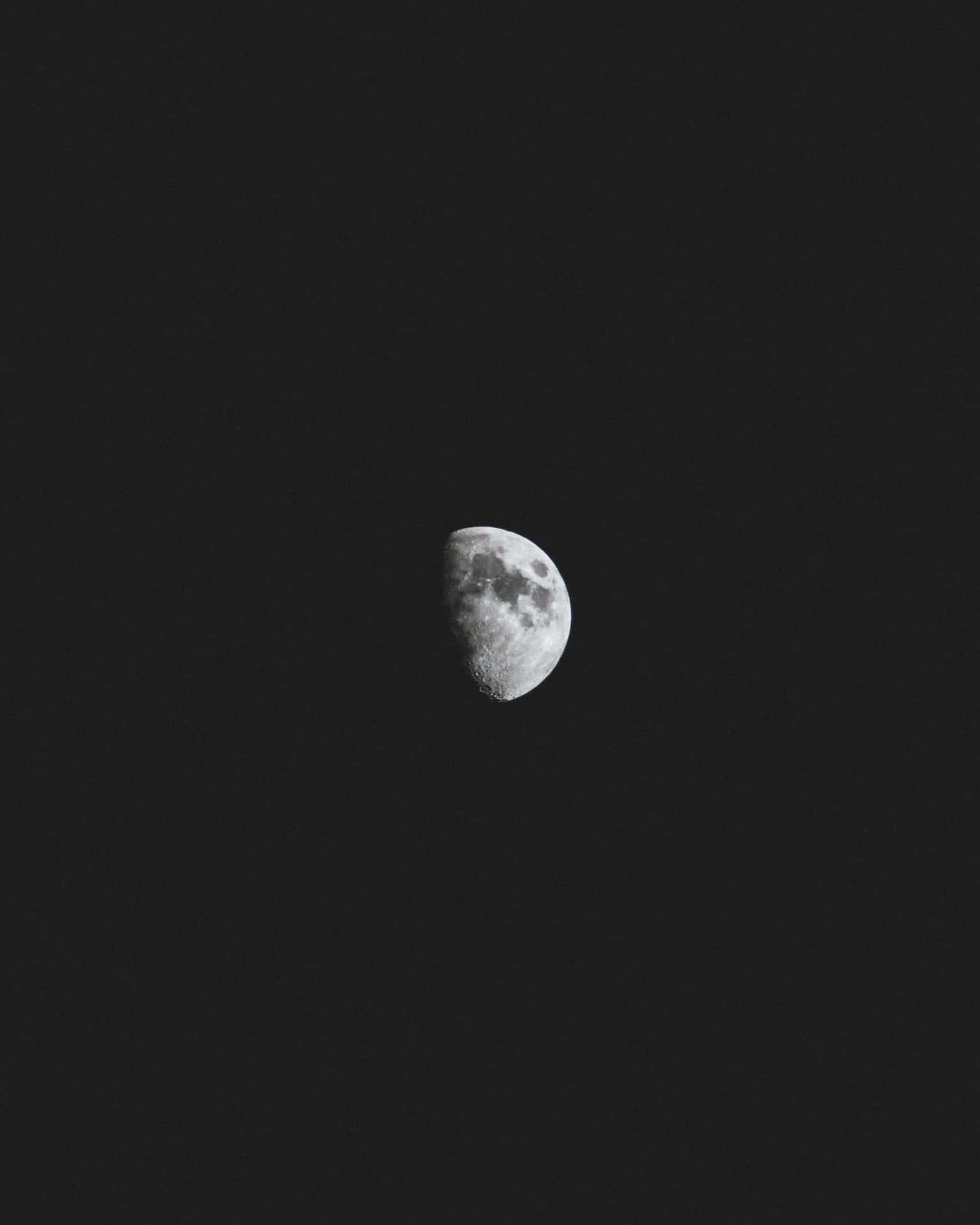 A Black And White Photo Of The Moon Background