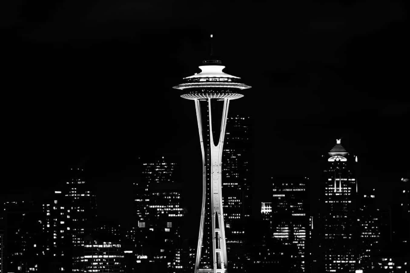 A Black And White Photo Of The Space Needle Background
