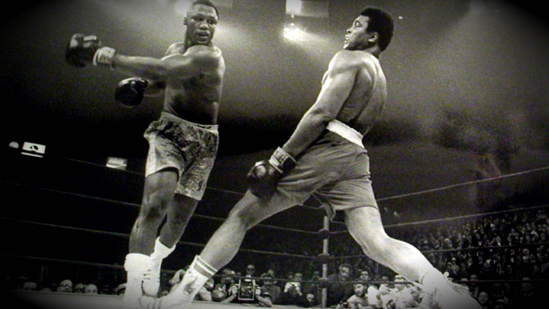 A Black And White Photo Of Two Boxers Fighting Background