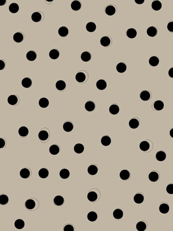A Black And White Polka Dot Pattern On A Beige Background Background