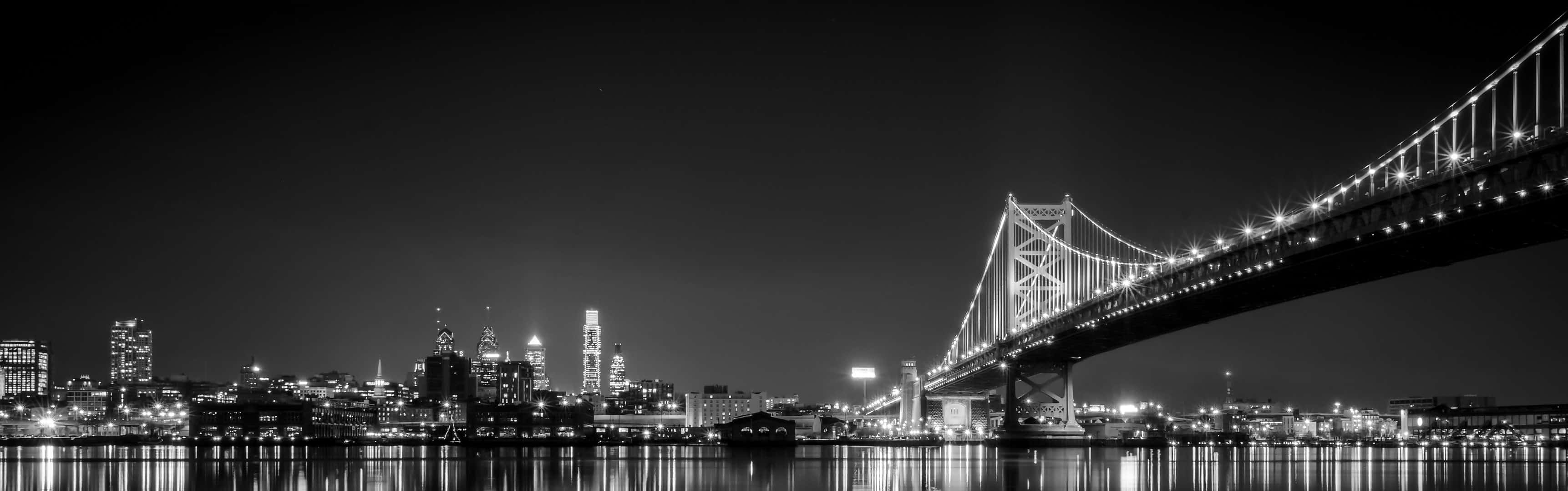 A Black And White View Of The Golden Gate Bridge In San Francisco