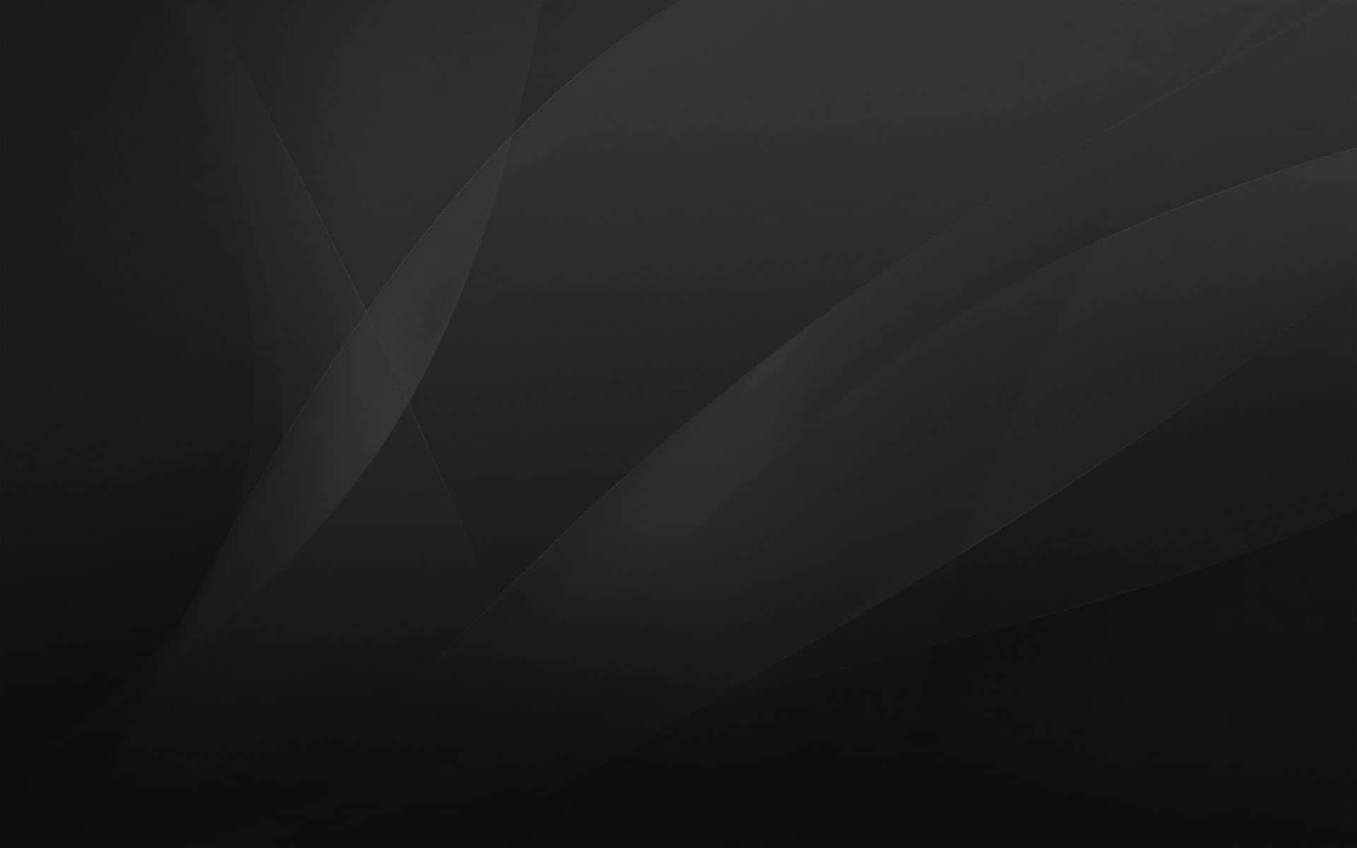A Black Background With A Black Wavy Pattern Background