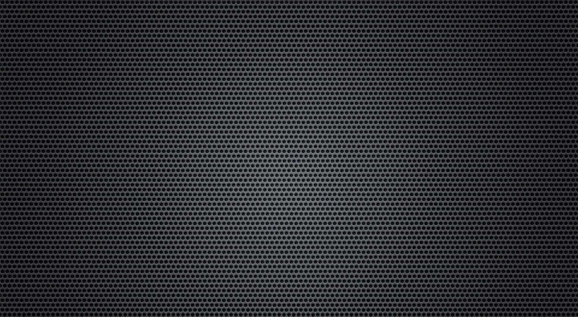 A Black Background With A Grid Pattern