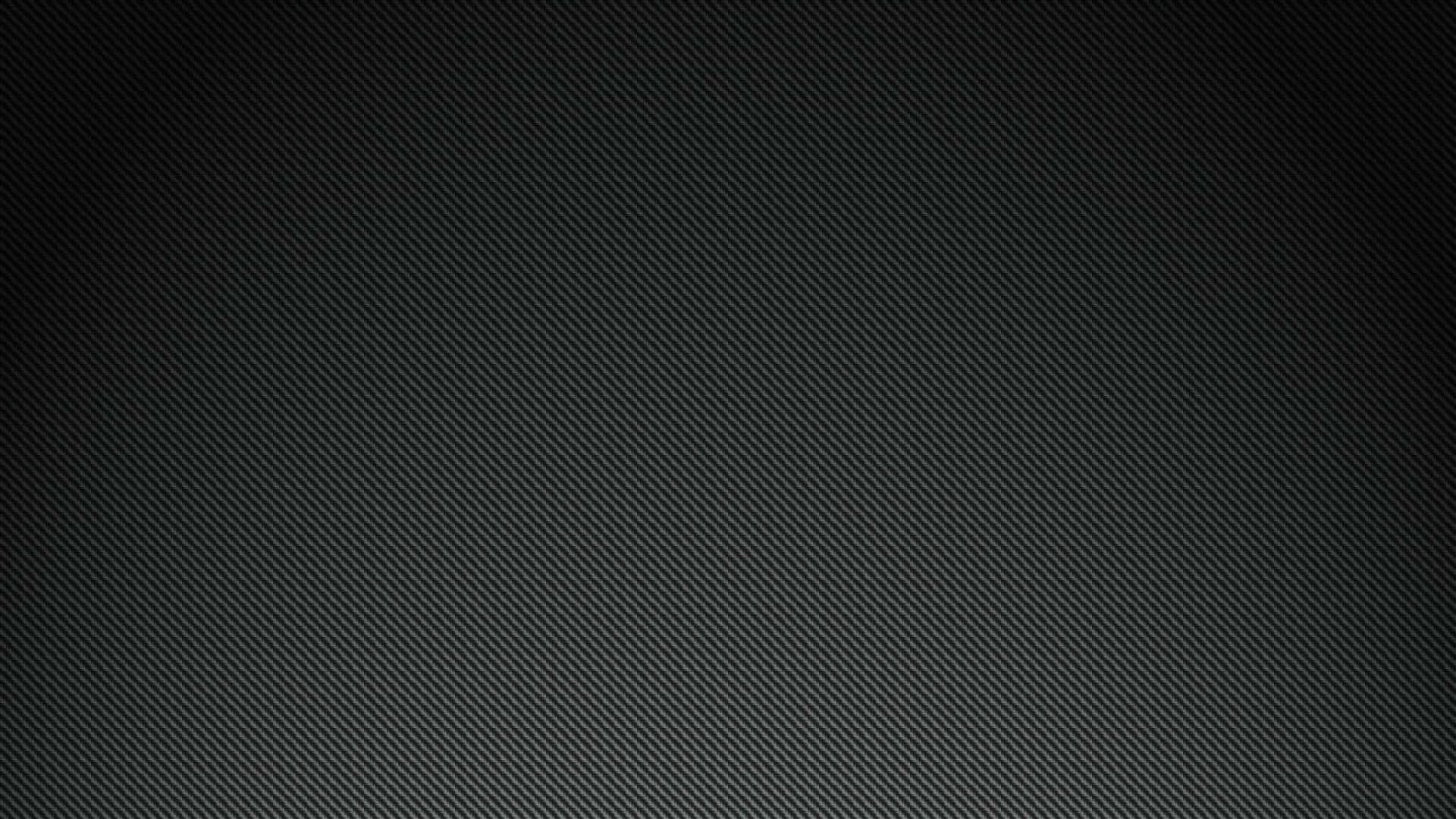 A Black Background With A Light Texture Background