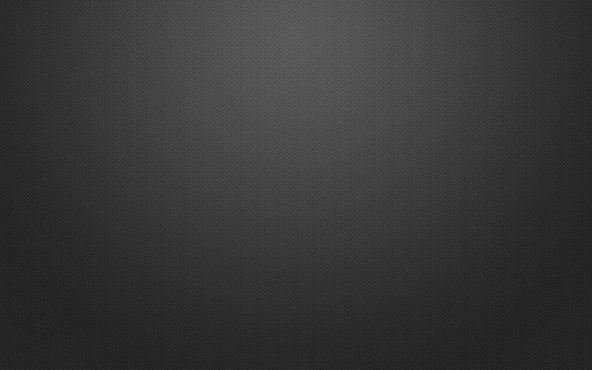 A Black Background With A Light Texture