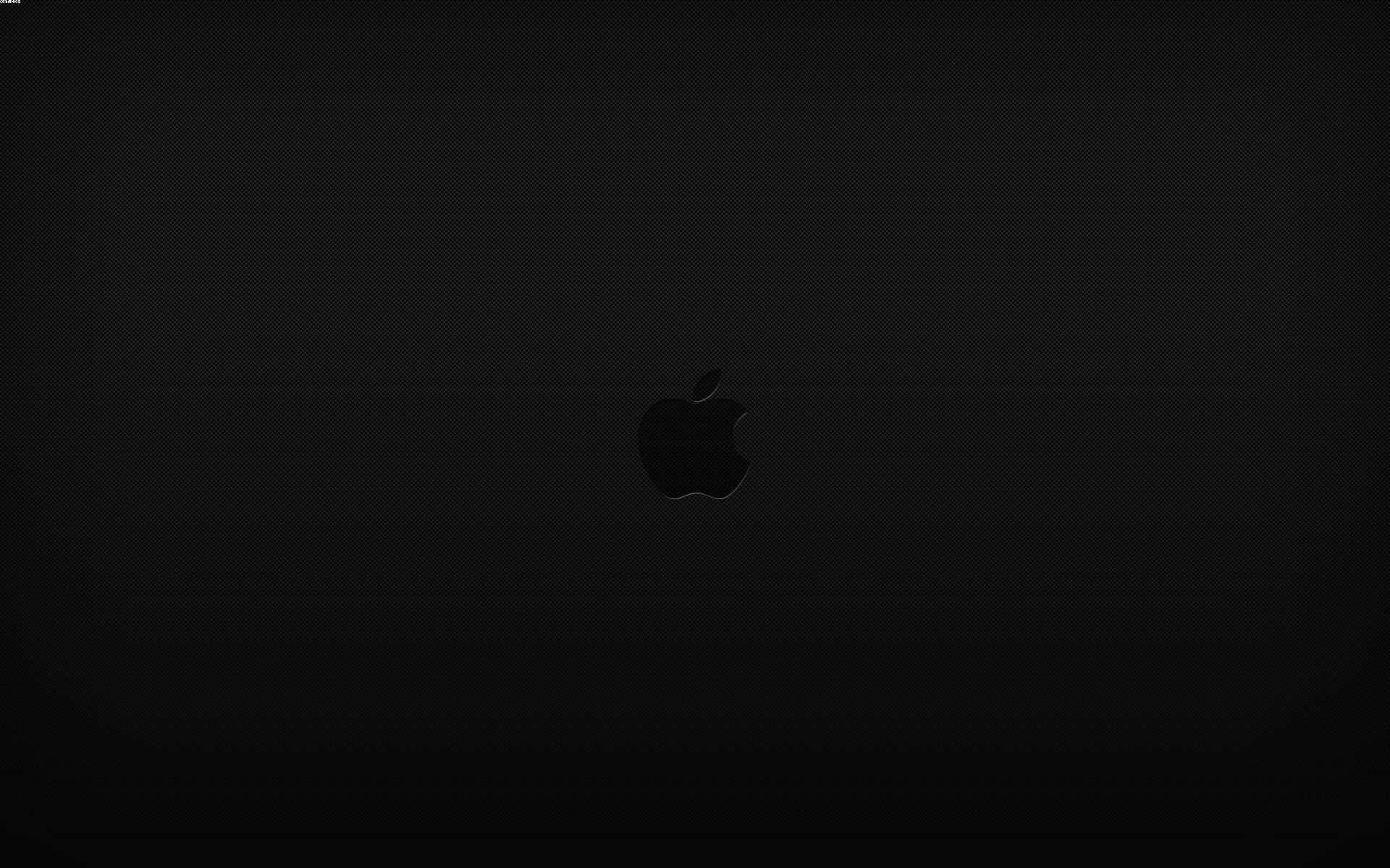 A Black Background With An Apple Logo Background
