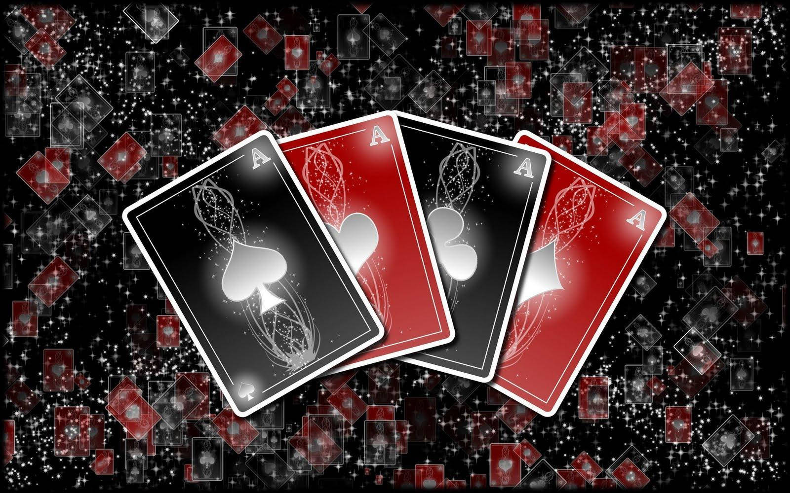 A Black Background With Playing Cards On It Background