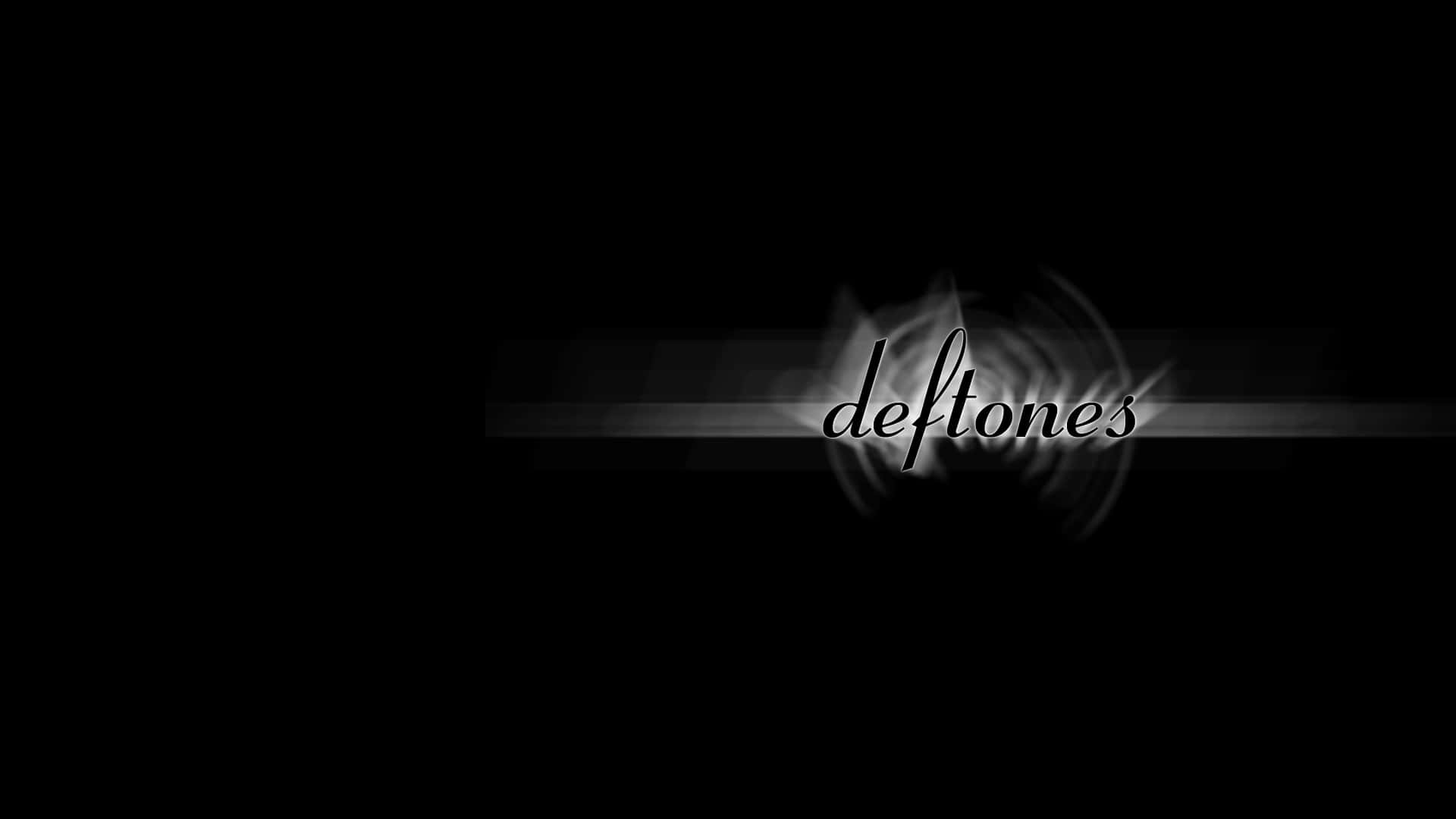 A Black Background With The Word Deftones On It Background