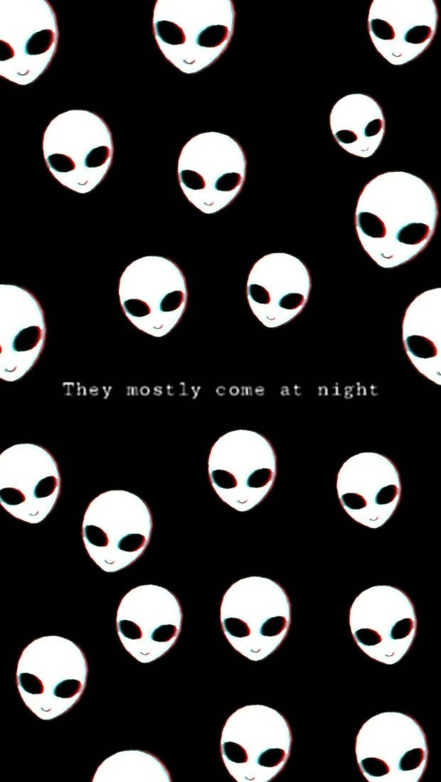 A Black Background With White Alien Faces Background