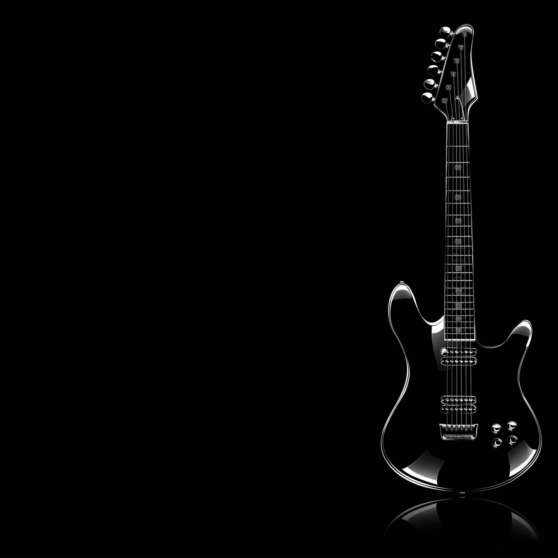 A Black Electric Guitar On A Black Background Background