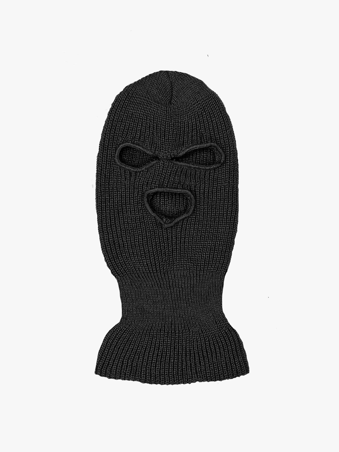 A Black Knitted Mask With A Face On It Background