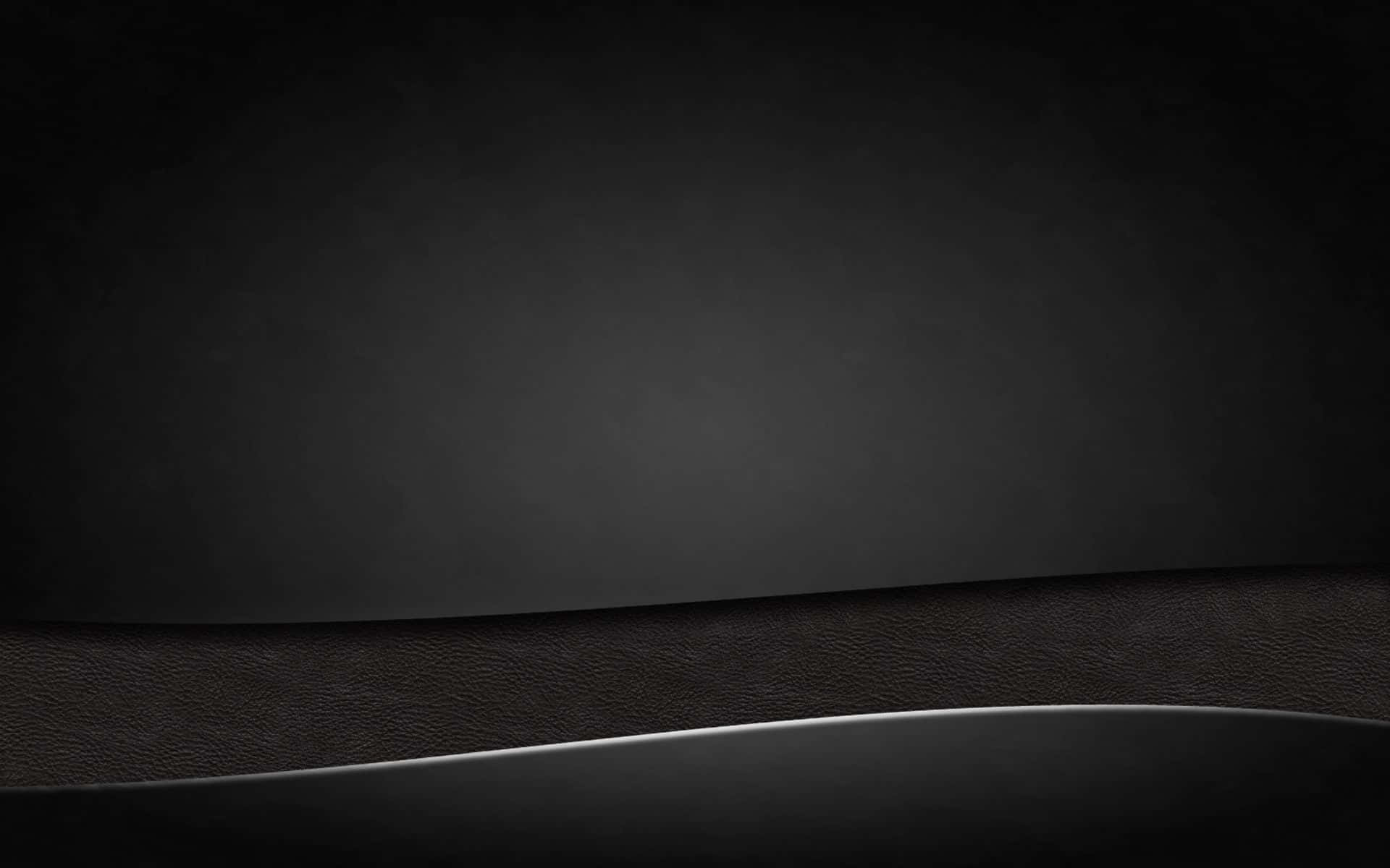 A Black Leather Background With A Silver Strip Background
