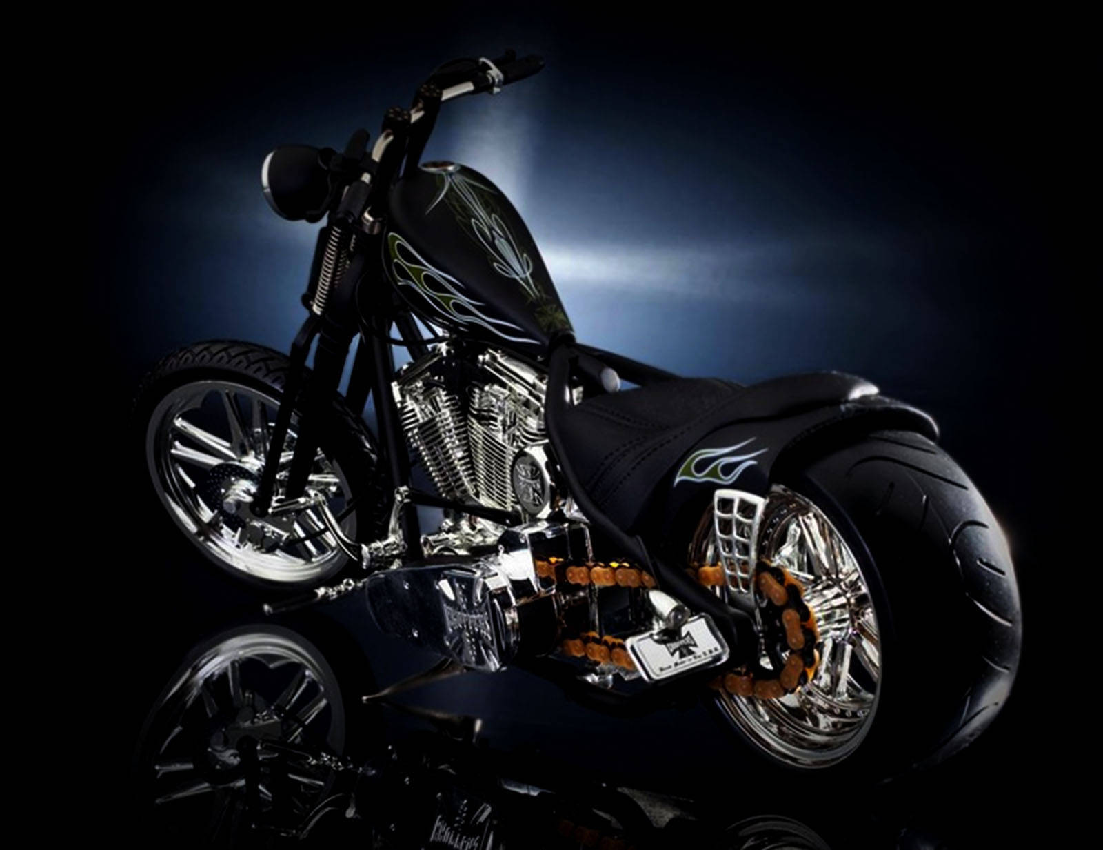 A Black Motorcycle With Chrome Wheels And A Chrome Frame Background