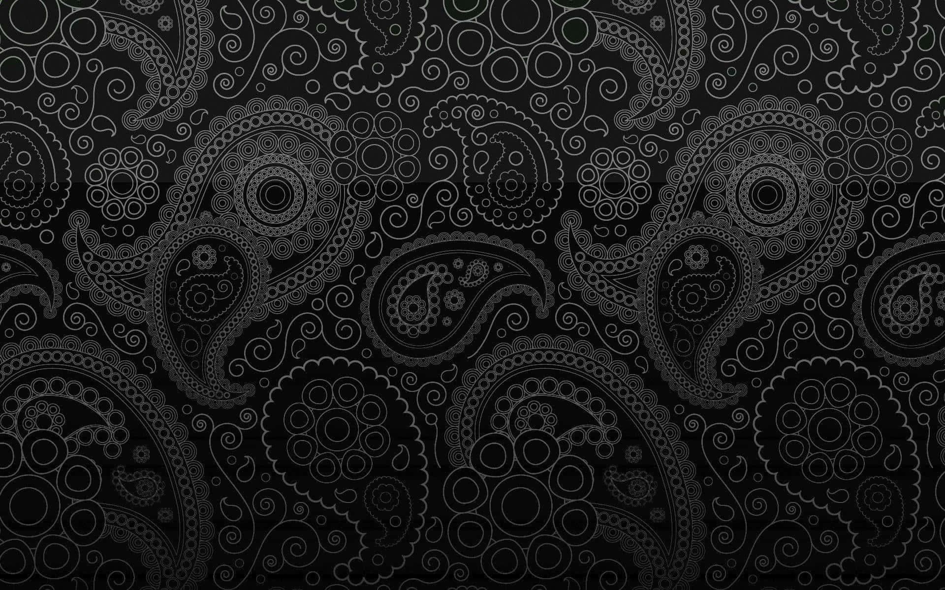 A Black Paisley Wallpaper With A Lot Of Swirls