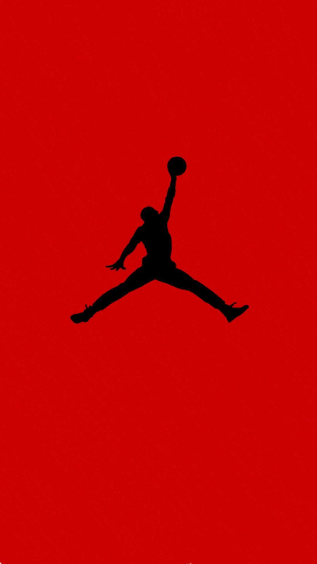 A Black Silhouette Of A Jordan Jumper On A Red Background Background
