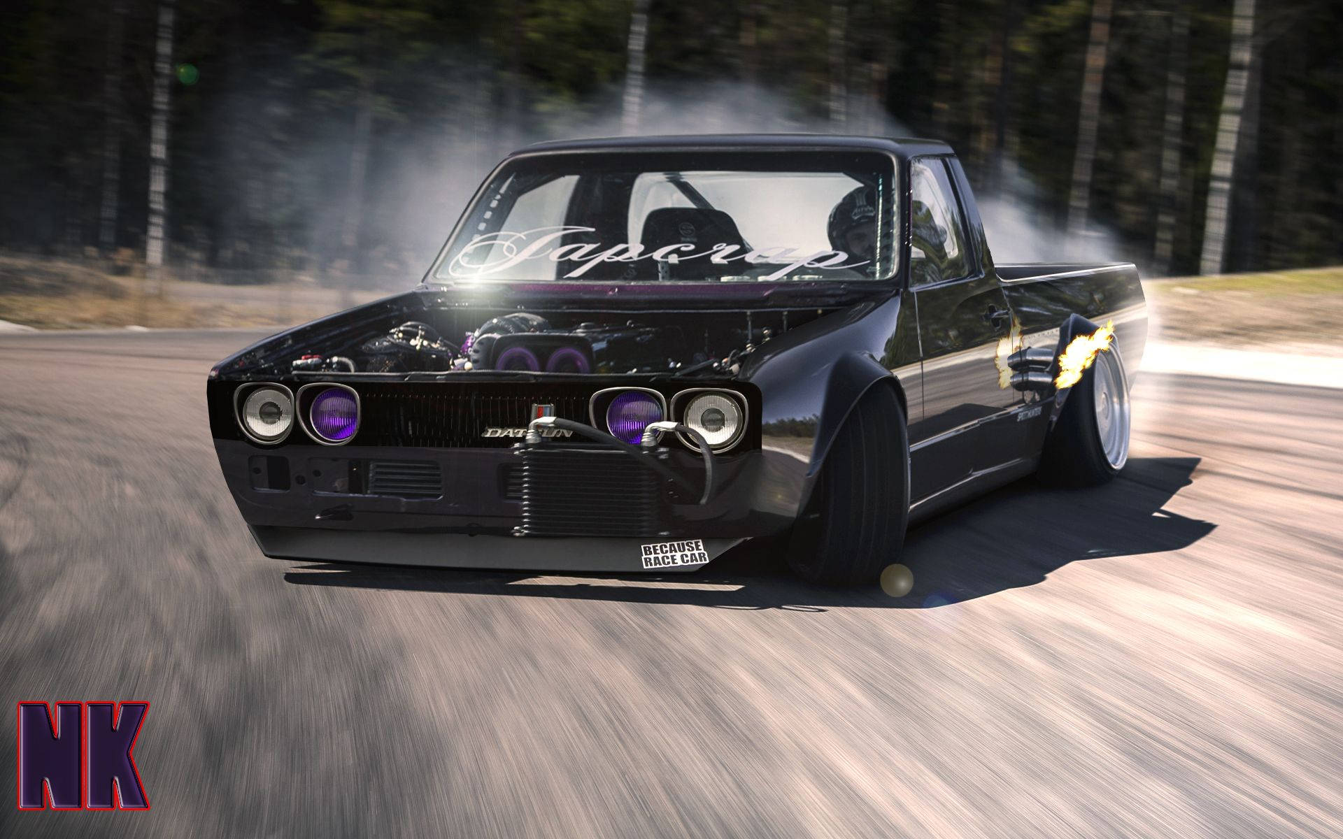 A Black Truck Driving Down A Road With Smoke Coming Out Of It Background