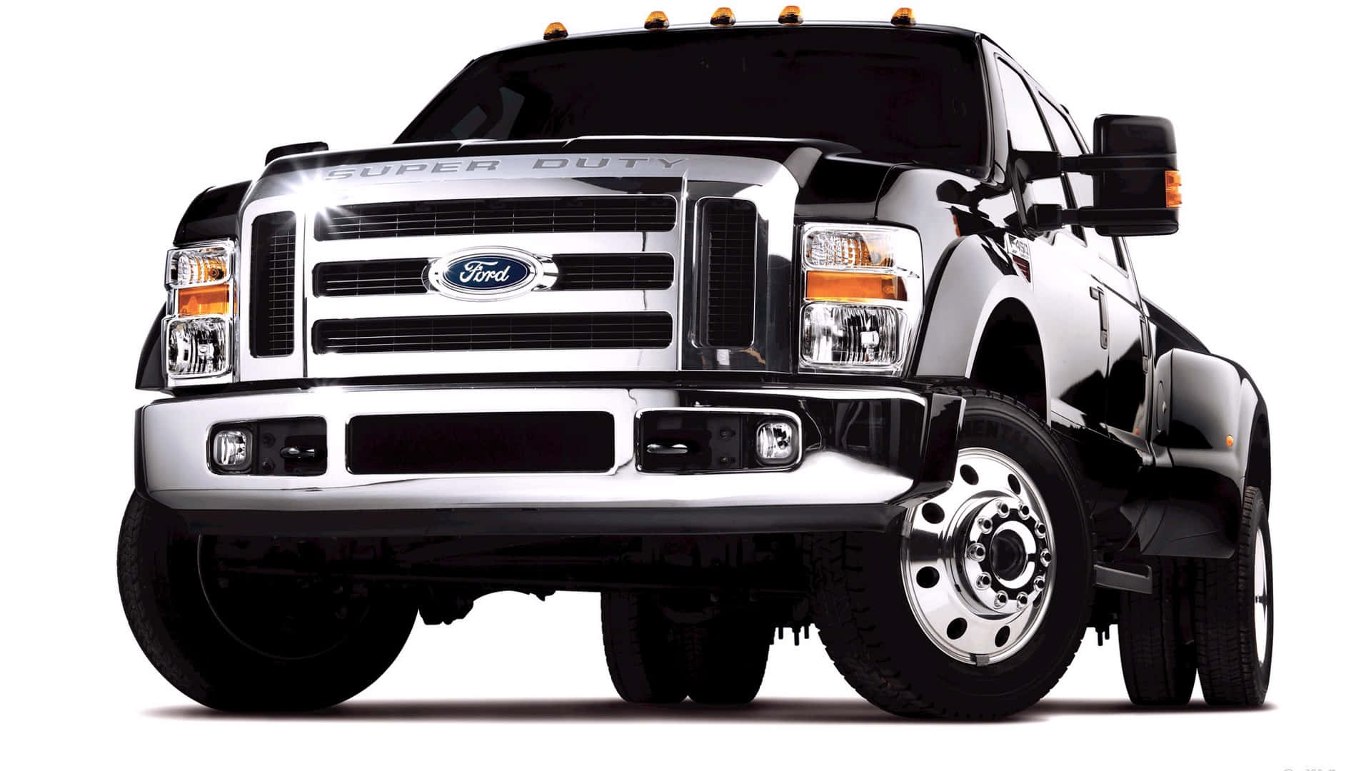 A Black Truck Is Shown On A White Background