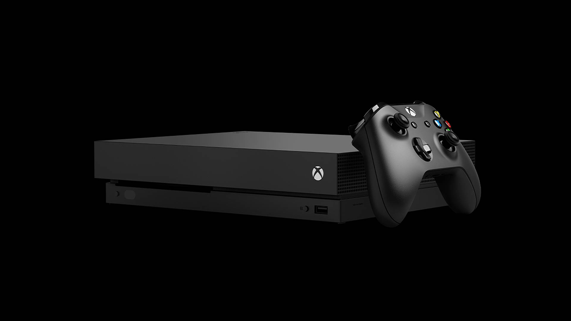 A Black Xbox One Console With A Controller Background