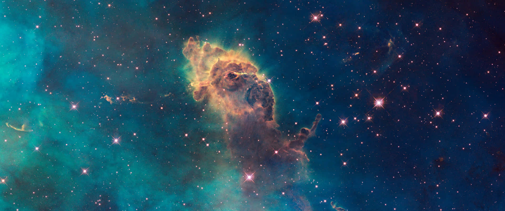 A Blue And Green Nebula With Stars In The Background Background