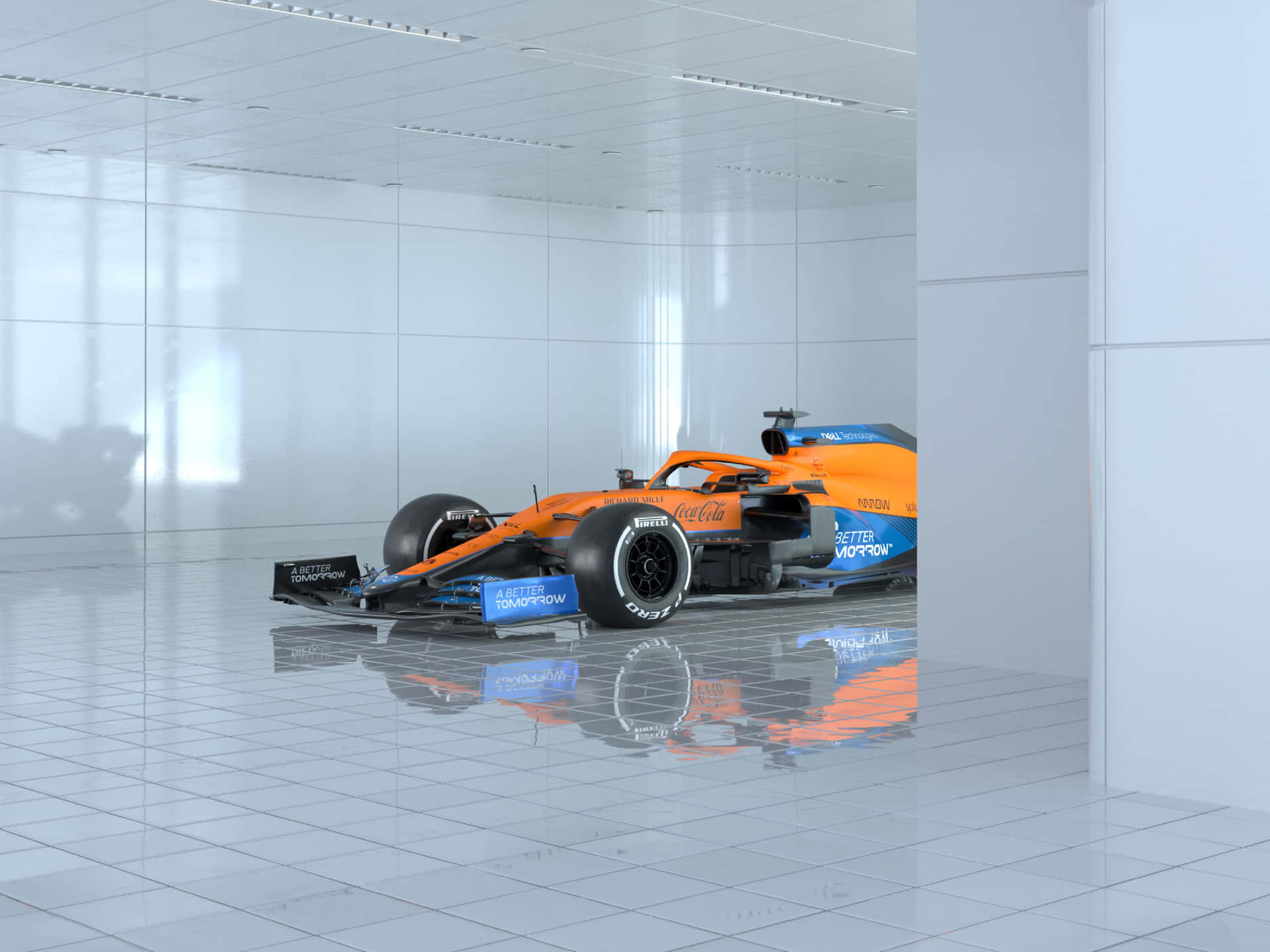 A Blue And Orange Racing Car Is Sitting In A Room Background